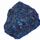 A one-millimeter diameter sample of glittery, cobalt-blue lutetium hydride.